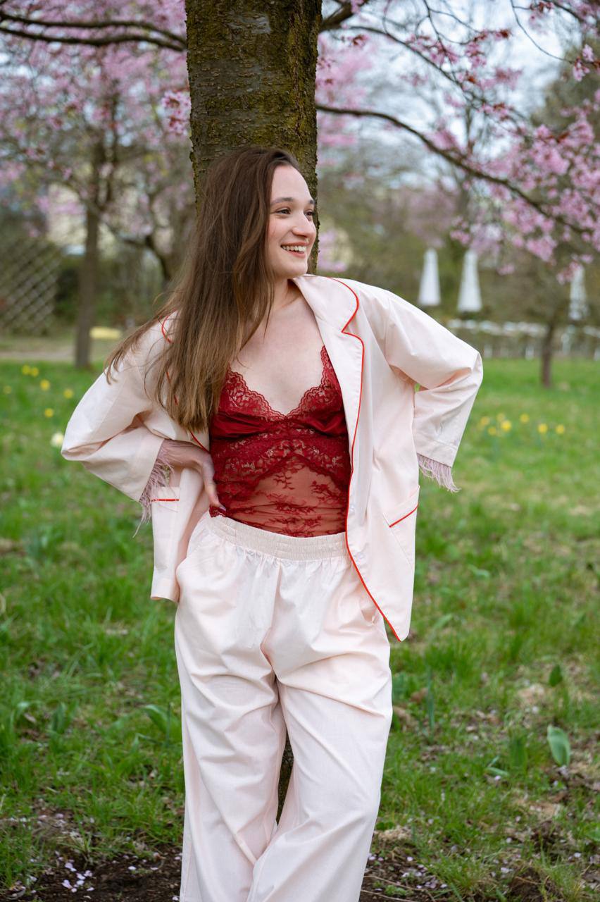 Model wearing the blush pink PJ set