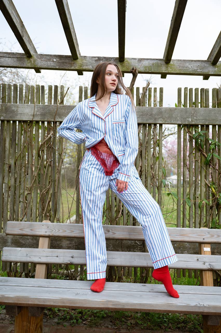 Model wearing the blue striped PJ set
